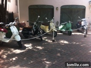 Vespa collection outside a Swiss Avenue home