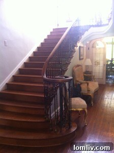 Grand stairwell with gossip seat