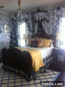 Antique bed in the toile guest bedroom