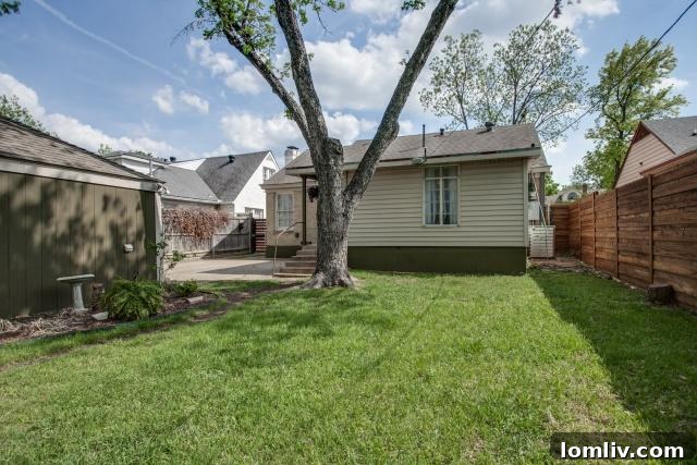 Spacious backyard and two-car garage at 2531 W 10th Street, providing ample outdoor living and storage