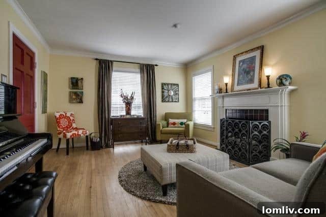 Formal living room at 2531 W 10th Street featuring dark jewel tones, creamy white walls, and built-in shelving