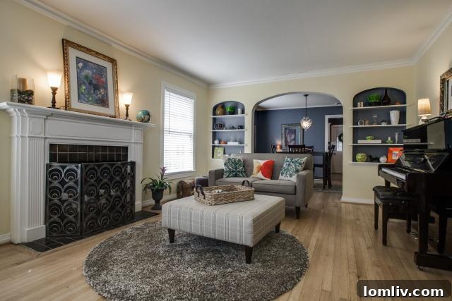 Detailed view of the living room fireplace and decor at 2531 W 10th Street, showcasing vibrant accessories
