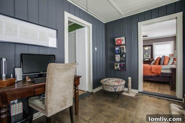 Cozy office area with painted paneling adjacent to the master bedroom at 2531 W 10th Street