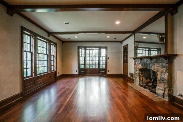 Spacious Living Room with Stone Fireplace at 4511 Arcady Avenue