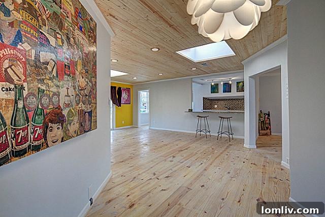 Modern and inviting hallway, showcasing the home's contemporary aesthetic at 9003 Groveland