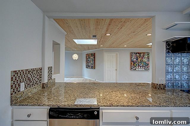 Convenient kitchen pass-through connecting to dining or living areas at 9003 Groveland