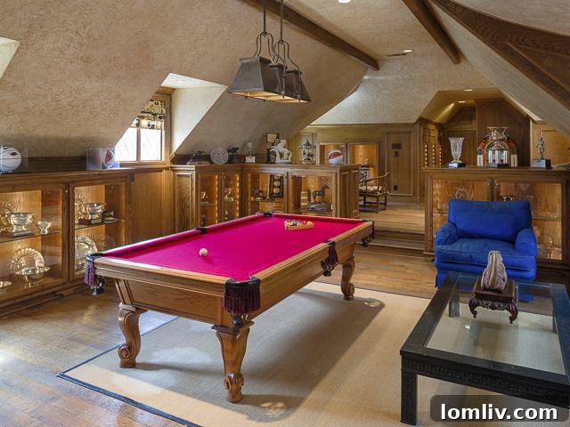 Spacious game room with wood-paneled walls and entertainment area upstairs at 9250 Meadowbrook
