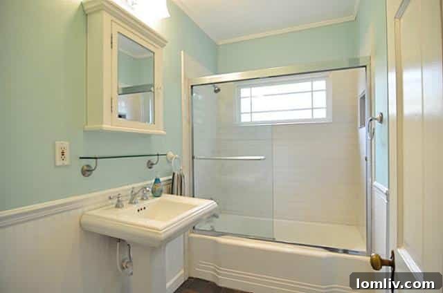 Retro-inspired bathroom with pedestal sink