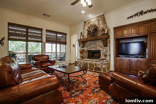 Spacious Family Room with Stone Fireplace and Built-ins