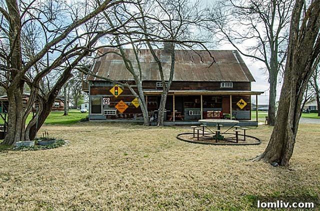 Charming guesthouse, tastefully converted from the original barn, on the 2113 Mangum estate, providing comfortable and private accommodations for visitors or potential rental income.