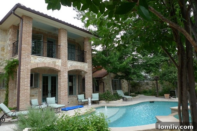 Inviting Rear Pool Area and Patio of the Brookcove Residence