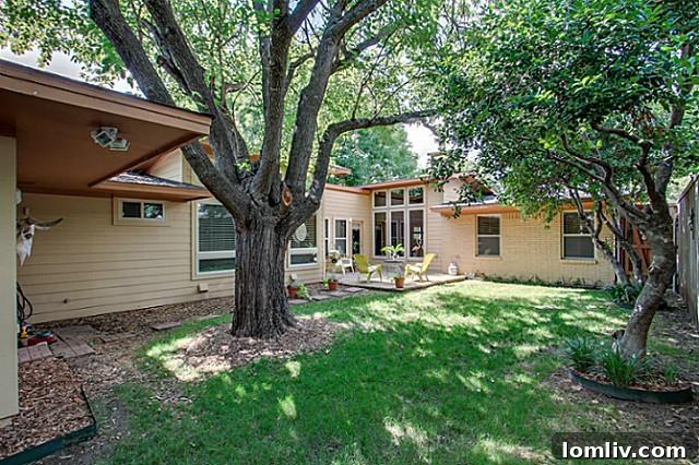 Spacious backyard ideal for entertaining and relaxation at the 6202 Monticello Midcentury Modern home