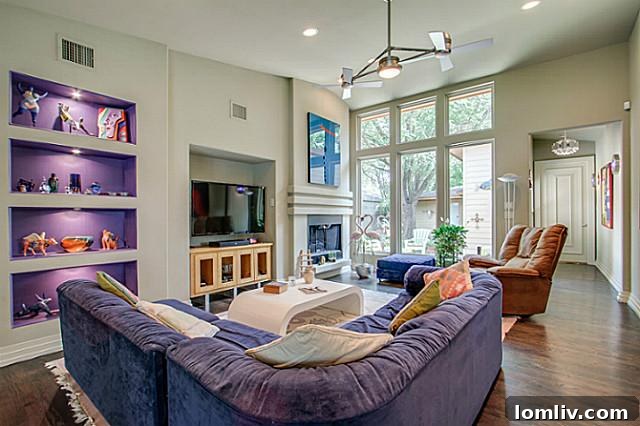 Vibrant and unique living room with floor-to-ceiling windows at 6202 Monticello, ideal for art display
