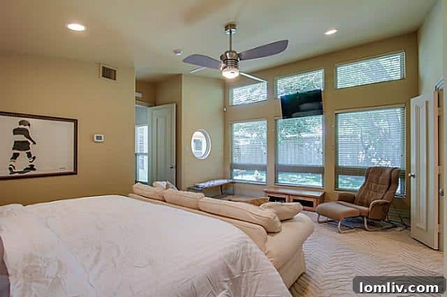 Another view of the spacious master bedroom, showcasing bold design in the Dallas Midcentury home