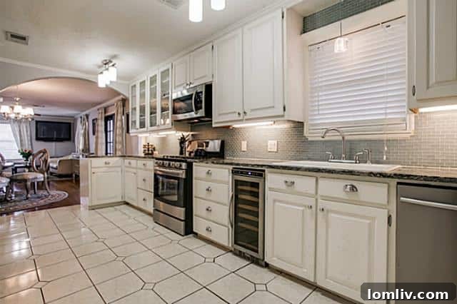 Modern Kitchen with Breakfast Bar in 9403 Thornberry Lane Home