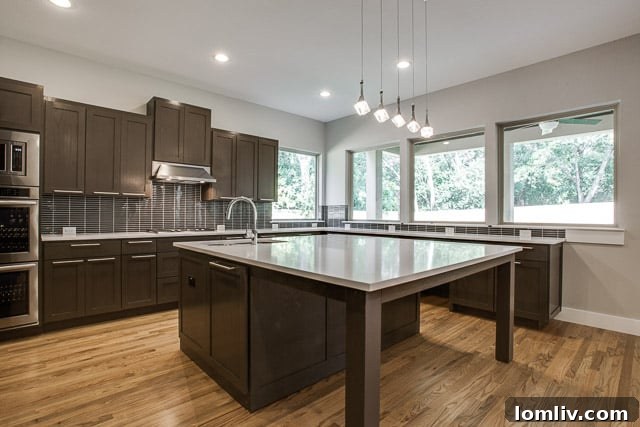 Custom homes are trending toward eat-on islands and more chrome in the kitchen.