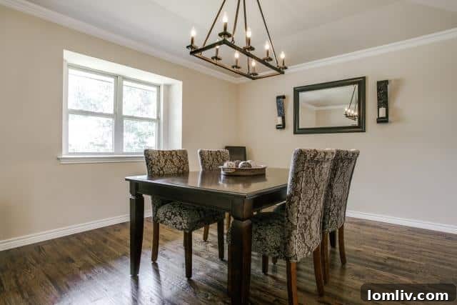 Elegant dining room with ample natural light in the 3747 Duchess Trail property