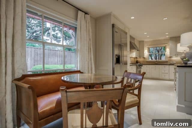 Bright Breakfast Area Overlooking the Backyard