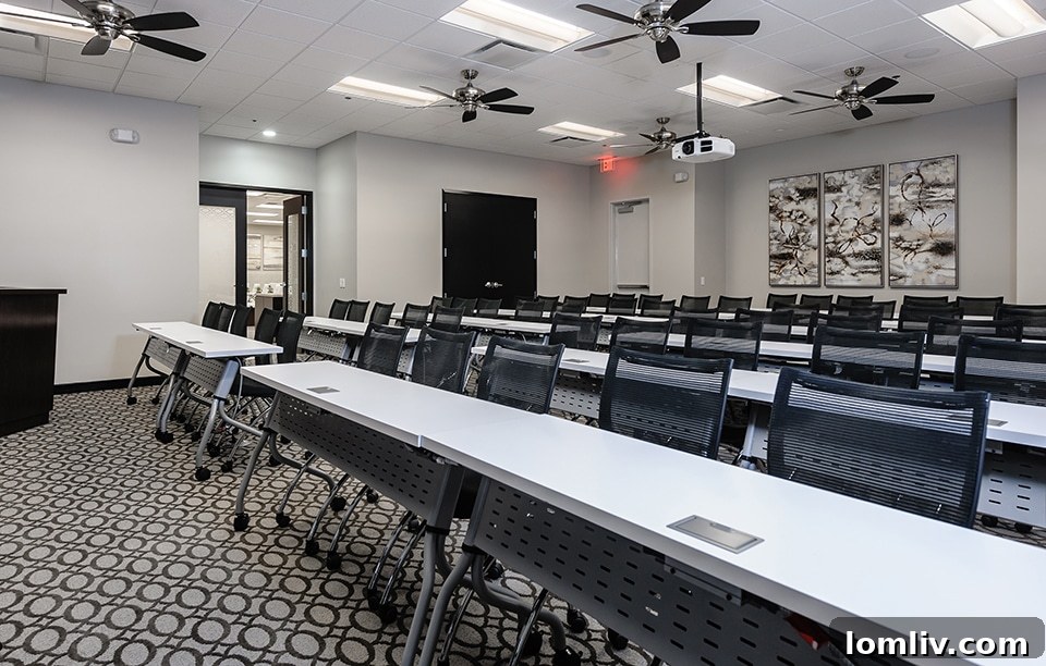 Stylish meeting room equipped with advanced presentation technology.