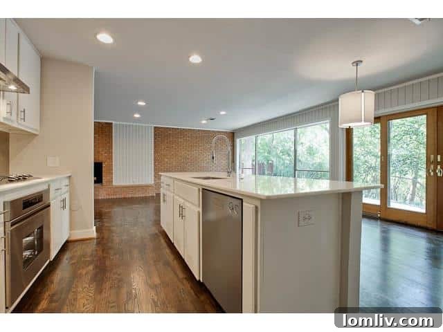 Modern Kitchen with Island and Stainless Steel Appliances
