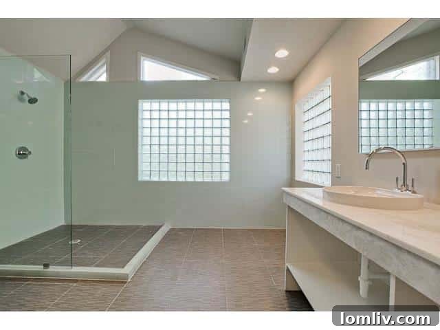 Elegant Master Bathroom with Modern Fixtures and Subway Tile