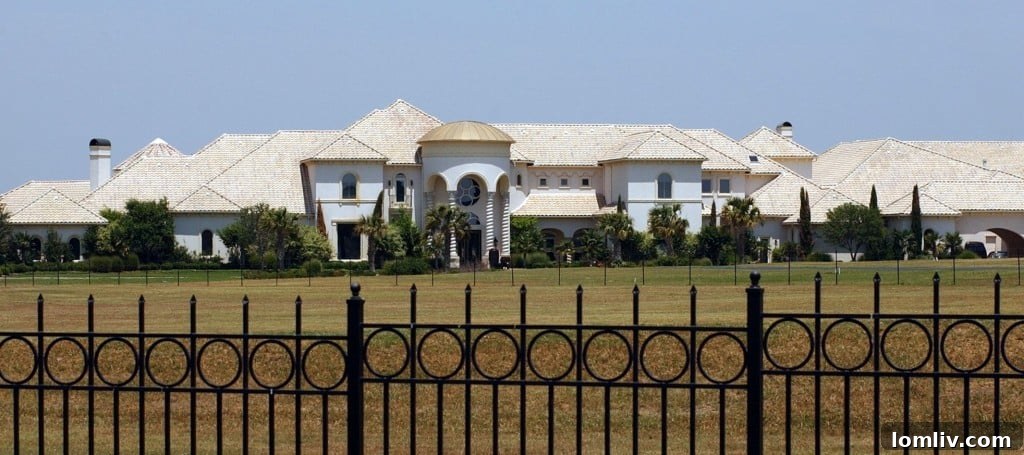 Another perspective of a grand entrance or a sweeping exterior view, linked to Deion Sanders' past or present residences.