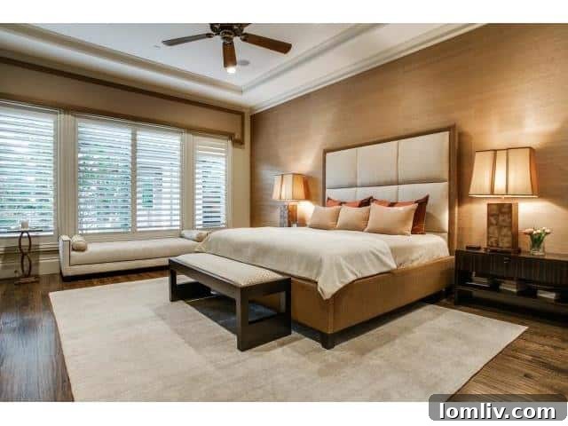 Spacious master bedroom with luxurious finishes and ample natural light