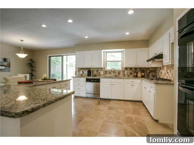 Gourmet Kitchen with L-shaped Island and Stainless Steel Appliances