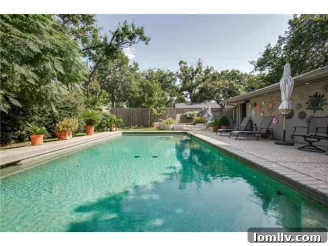 Inviting Swimming Pool and Pergola in Private Backyard