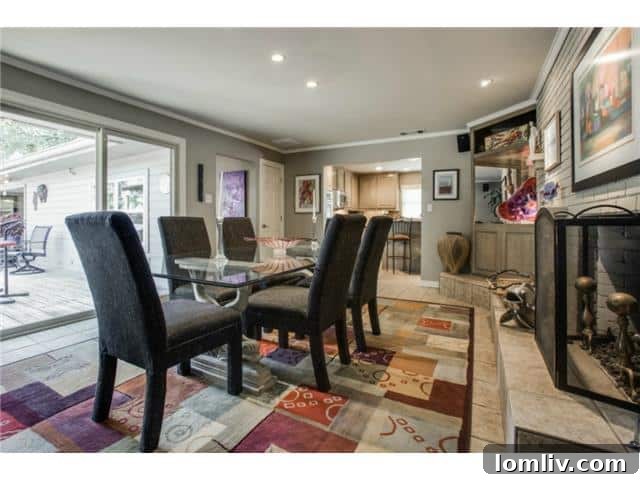 Formal Dining Room Featuring See-Through Fireplace at 2848 Woodmere