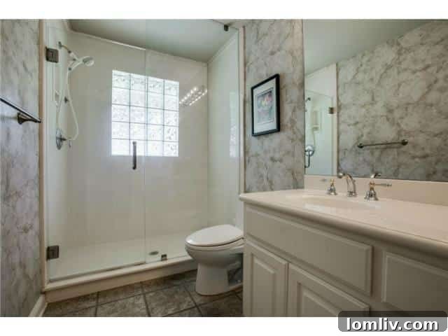 Modern Hall Bathroom with Walk-In Shower at 2848 Woodmere