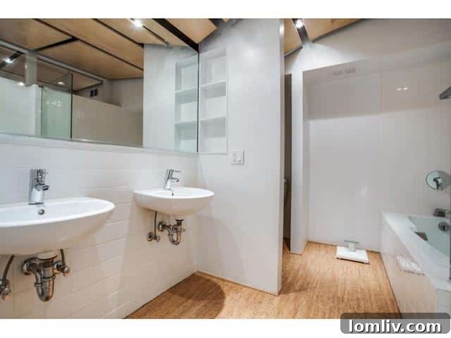 Luxurious master bathroom with dual vanities