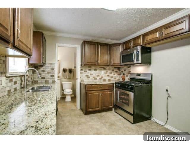 The kitchen's inefficient layout, with an awkward space between the wall and the range, highlights poor planning. A toilet visible nearby raises questions about design choices.