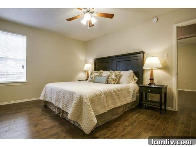 A modest bedroom with simple decor, illustrating the need for creative space utilization in smaller homes.