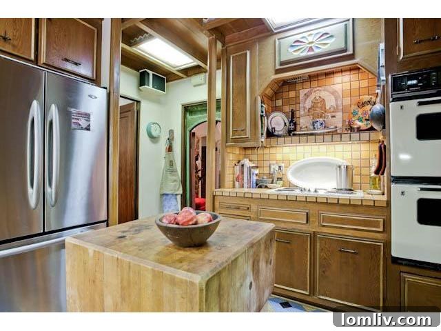 Close-up of the kitchen details at 3544 Rankin Street, including antique-style cabinetry and tile work.