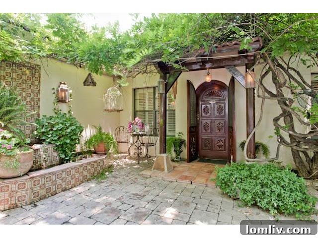 The charming courtyard and inviting exterior of 3544 Rankin Street, a Mediterranean masterpiece in Dallas's University Park.