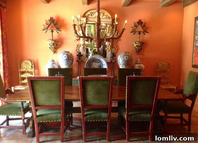 Jane McGarry's dining room with an 18th-century Italian antique dining set and chandelier, exuding timeless elegance.
