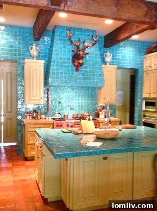 Close-up of luminescent turquoise tiles in Jane McGarry's former West Fort Worth kitchen, showcasing her love for color.