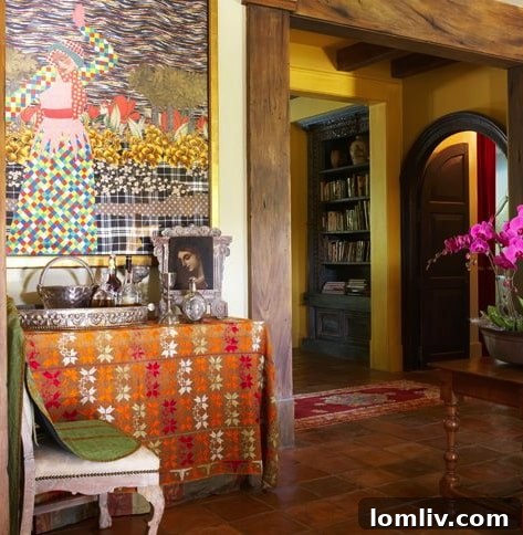 Interior of Jane McGarry's home featuring an eclectic mix of Spanish, Italian, and Mexican antiques and art, creating a rich 'Italian/Hacienda' decor.