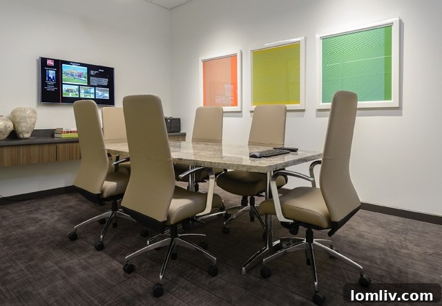 Collaborative workspace with contemporary furniture in Ebby Halliday's office