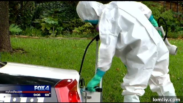 Dallas Nurse Becomes Nation's First Domestically Acquired Ebola Case, Second Overall 4 Dallas skyline with emergency response vehicles during the Ebola incident