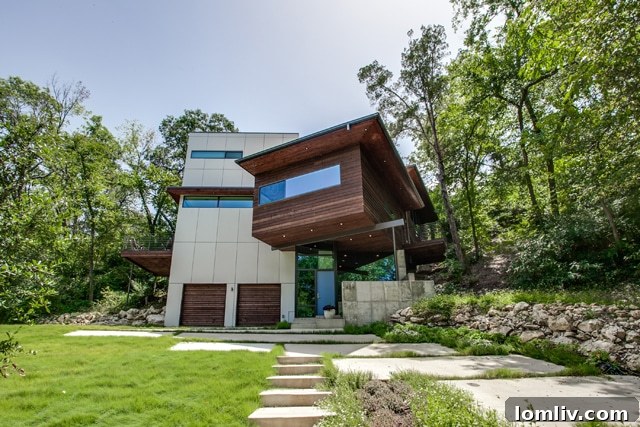 A striking modern home at 434 W. Greenbriar Lane in Dallas, showcasing contemporary design elements, part of the Old Oak Cliff Conservation League Fall Home Tour.
