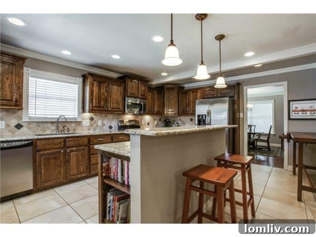 Modern Kitchen with Dark Wood Cabinets and Stone Backsplash