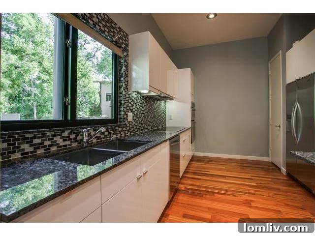 Overhead view of the sophisticated kitchen featuring high-end finishes and open layout