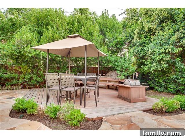 Sparkman Club: A Blend of Classic Elegance and Modern Luxury, Featuring a Magnificent Pool 17 Inviting outdoor dining deck, ideal for entertaining guests or enjoying meals al fresco.