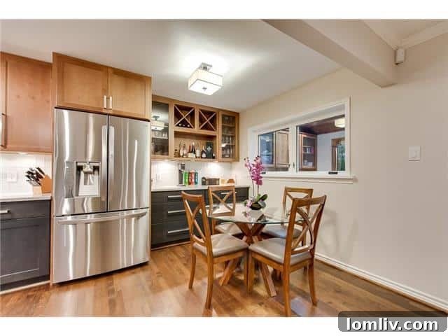 Inviting breakfast nook adjacent to the kitchen, offering a casual dining space with natural light.