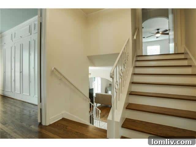 Elegant staircase at 1108 Valencia connecting the split levels