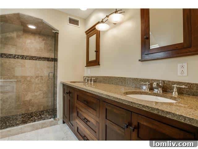 Modern master bathroom with oversized shower and double vanity at 1108 Valencia