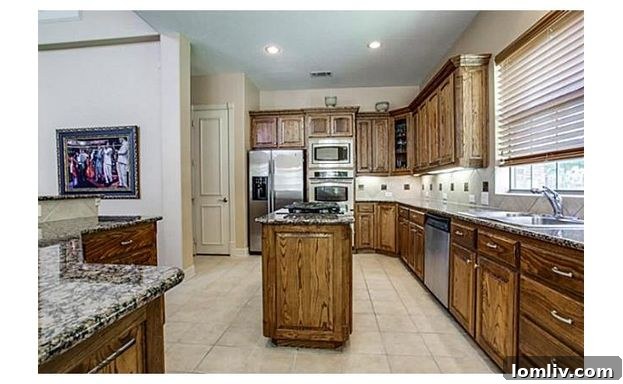 Another View of the Stylish Kitchen at 609 Stonebury Drive