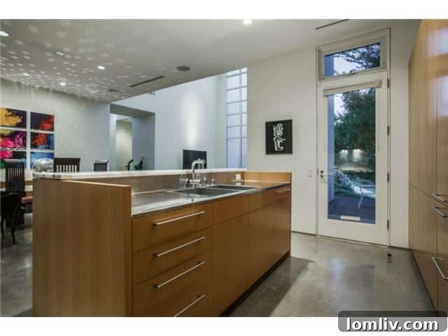 Sleek Modern Kitchen with Island and Bar Seating